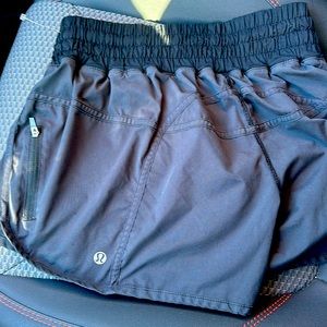Lululemon size 8 shorts, black. Worn spots